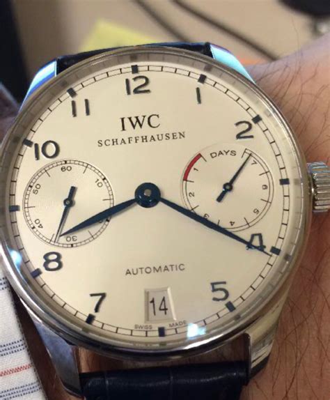 iwc portuguese vs omega speedmaster